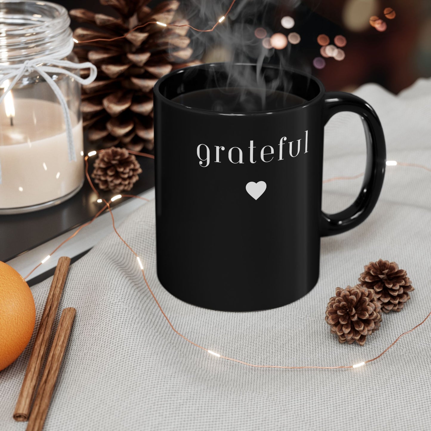 Grateful Black Mug- BPA and Lead-free, microwave & dishwasher-safe, and made of white, durable ceramic in 11-ounce and 15-ounce sizes.