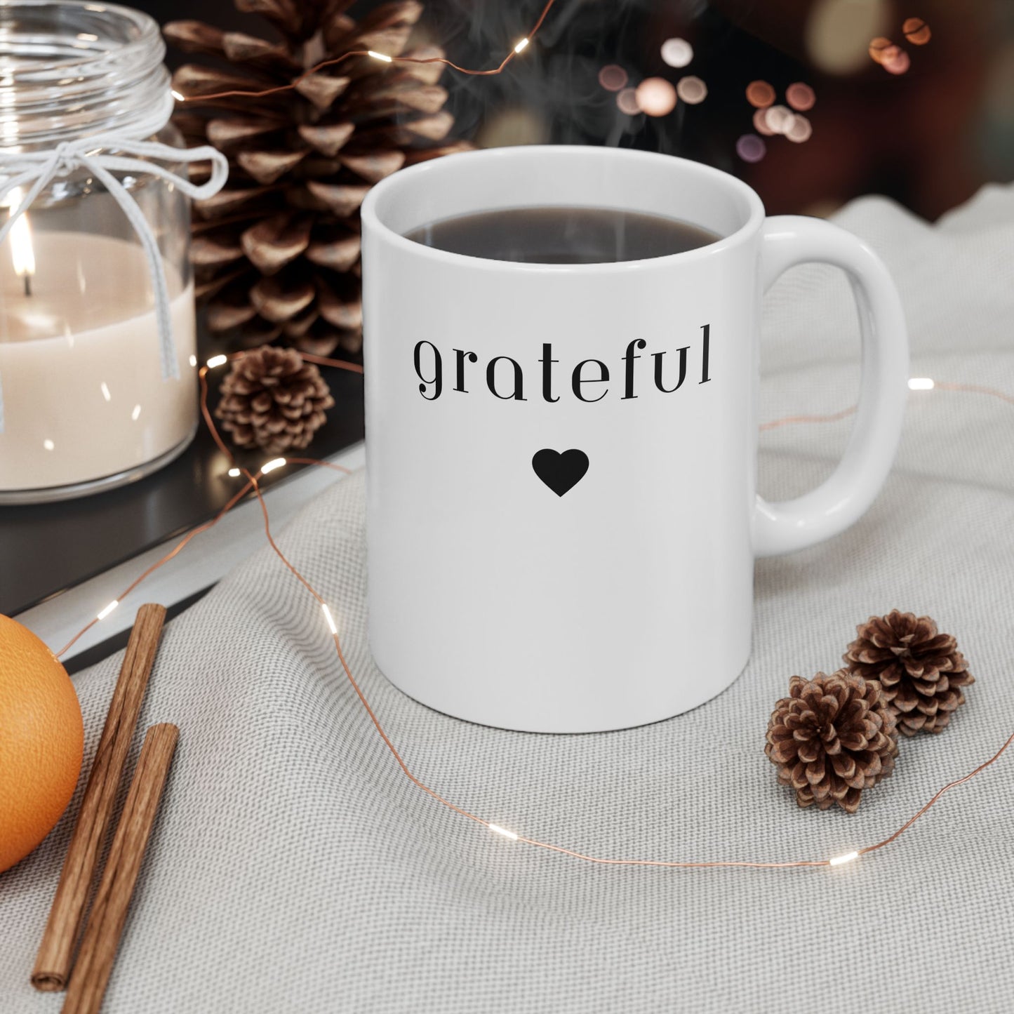 Grateful -White Mug,  BPA and Lead-free, microwave & dishwasher-safe, and made of white, durable ceramic in 11-ounce and 15-ounce sizes.